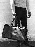 Edmond Snr Large Leather Weekend Travel Bag Brown Model Holding In Right Hand